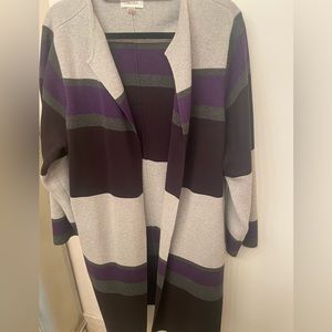 Calvin Klein long-sleeved jacket w/side pockets. Purple, black & grey stripes.